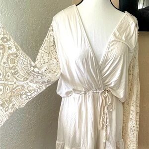 NWT! Cream colored long sleeved romper by Sky size L